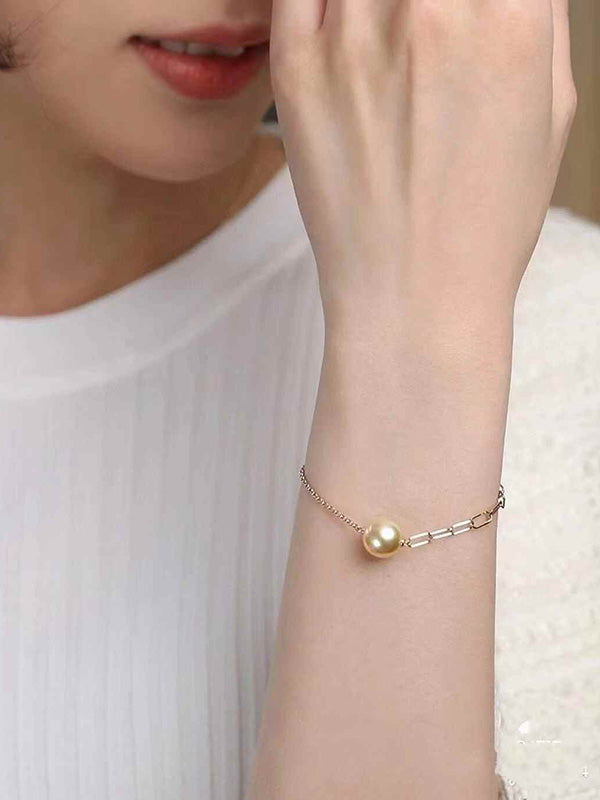 “ Quidditch ” Seawater Cultured South Sea Golden Pearl Bracelet 18K Gold Chain Intensely Golden Hue 10-11mm